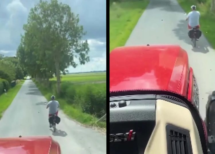 Irritante fietser is niet van plan om opzij te gaan voor deze tractor